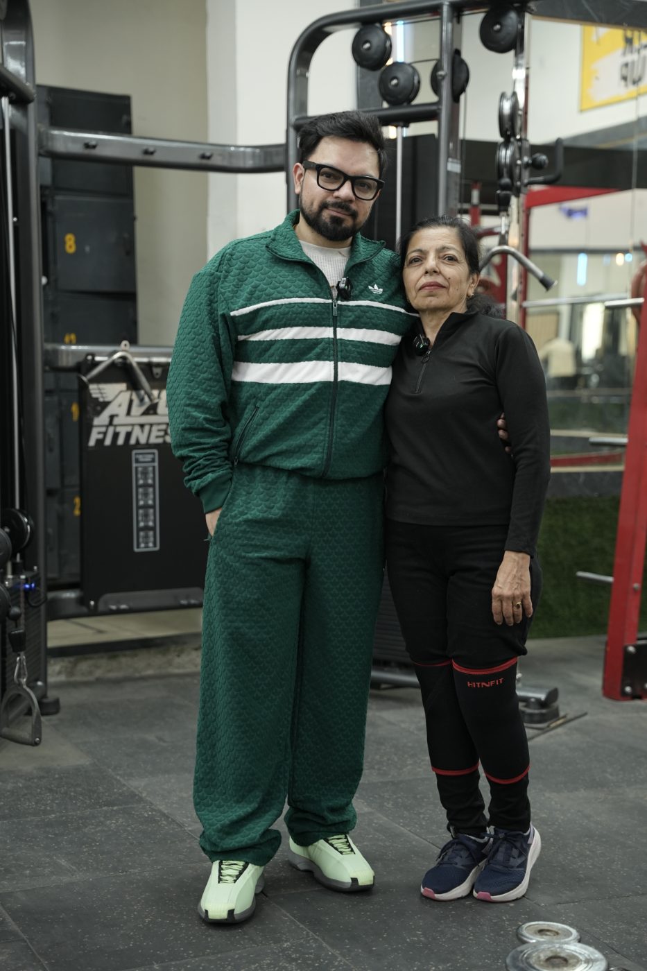 Aggam with his mother at the gym